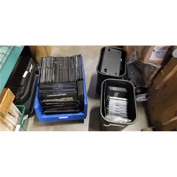 LARGE BLUE ULINE PARTS ORGANIZER AND TWO PLASTIC BINS FULL OF NEW LICENSE PLATE COVERS