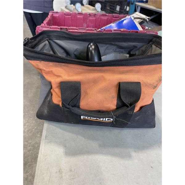 TOTE WITH TOOLS INCLUDING MACHETE, RIDGID TOOL BAG, HATCHET ETC