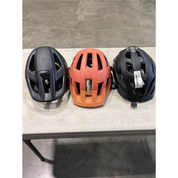 3 BIKE HELMETS. HAS MIPS