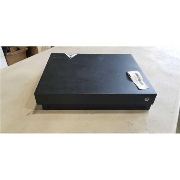 XBOX ONE X BLACK, POWERS ON. NO CHARGER