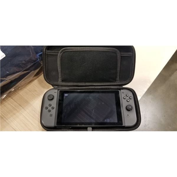 NINTENDO SWITCH IN SOFT CASE WITH 6 GAMES INCLUDING ZELDA TEARS OF THE KINGDOM, ZELDA BREATH OF THE 