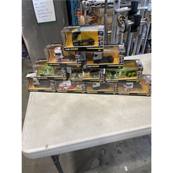 10 MAISTO DESIGN MODEL TRUCKS IN BOX