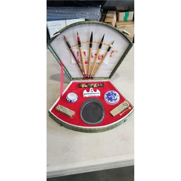CASED EASTERN STAMP AND PAINT SET