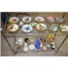 Image 2 : Half Rack of Collectibles.-Plates, Knick Knacks
