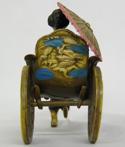 Japanese Rickshaw and Shell Figurines