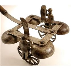 Cast Iron Push Toy with Bells & Figures