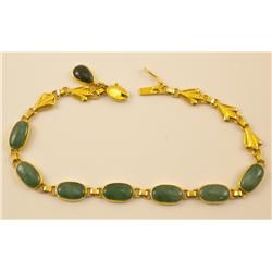 * Lady's 18 kt Gold Bracelet with 7 Jade Cabochons
