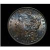 Image 1 : Rainbow Toned 1884-p Morgan Dollar grades Gem Uncirculated ms65