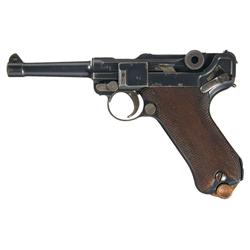WWI German 1915 DWM Luger Pistol With Two Magazines and a Brown Leather Holster