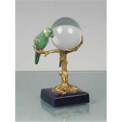 CRYSTAL BALL WITH BIRD ON BRASS STAND WITH PORCELAIN BASE