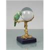 Image 1 : CRYSTAL BALL WITH BIRD ON BRASS STAND WITH PORCELAIN BASE