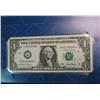Image 2 : 831. Series 2001 Texas Dollar. Unc. Star Note.