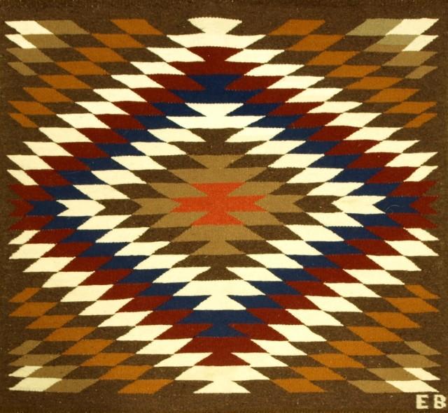 Traditional Navajo rug in serrated diamond pattern
