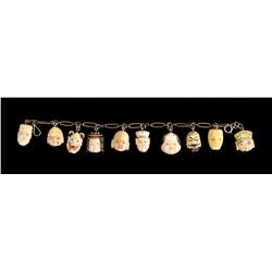 Chinese Qing Carved Ivory Face Bracelet