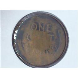 MAGICIANS COIN ( 2 LINCOLN CENTS 1 IN THE OTHER)