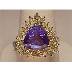 14K GOLD LADIES TANZANITE AND DIAMOND RING - SIZE 