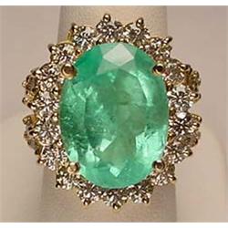 14K GOLD LADIES EMERALD AND DIAMOND RING - SIZE 7 