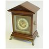 Image 1 : Oak or walnut bronze claw footed mantle clock
