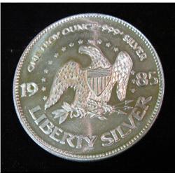 19. 1985 "Liberty Silver" by A-Mark. One Troy Ounce .999 Fine Silver.