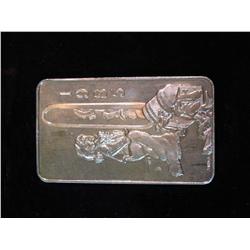 44. 1985 One Troy Ounce .999 Fine Silver Ingot. Depicts young boy climbing