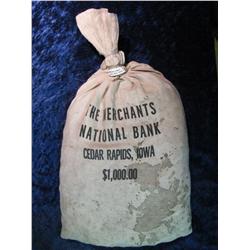 100. Unsorted bag of more than 5,000 U.S. Wheat Cents.