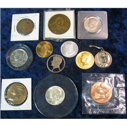 419. (12) John F. Kennedy Related Items including a gold-plated Half Dollar,