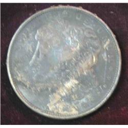 442. 1921 D U.S. Morgan Silver Dollar. Deeply toned VF.