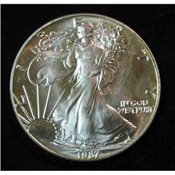 445. 1987 American Eagle Silver Dollar. .999 Fine Silver One Ounce.