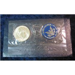 653. 1973 S Silver Eisenhower Dollar in original Government issued blue pack.