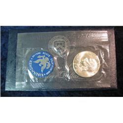 657. 1974 S Silver Eisenhower Dollar in original Government issued blue pack.