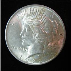704. 1922 P U.S. Peace Silver Dollar. AU 55.
