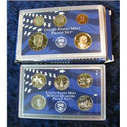 1104. 2000S US Proof Set. Water Damage to Box Coins Look Fine.