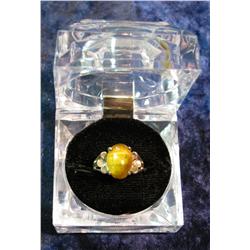 1397. Sterling Silver with Tiger Eye stone.  Approximately size 7.