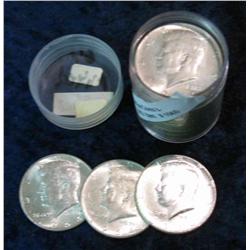 1560. 1964 P & D Mixed 90% Silver Kennedy Half Dollars. Circulated.