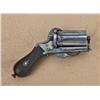 Image 1 : Pinfire revolving pepperbox pistol of the Apache  style, blued finish, checkered wood grips,  Birmin