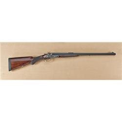 Exposed hammer double rifle, .45-70 caliber, by  Pedersoli of Italy, 24” heavy barrels, 3-leaf  fold
