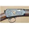 Image 2 : Winchester model 63, .22 long rifle,  semi-automatic, nicely engraved and gold inlaid  with checkere
