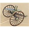 Image 1 : Miniature exposed-barrel Gatling gun with canister  feed on field carriage. .22 long rifle caliber, 