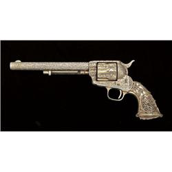Colt Single Action Army revolver, .45 caliber,  7-1/2” barrel, ornately scroll engraved, gold  plate
