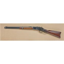 Winchester model 1873 lever-action carbine, .44-40  caliber, blued finish, standard wood stocks, fin