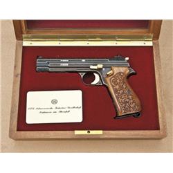 Sig model P210 9mm semi-automatic pistol, fully  and finely deluxe engraved, gold inlaid, carved  wo