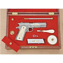 Colt government model .45 ACP caliber  semi-automatic pistol, exhibition engraved in gold  inlaid in