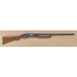 Remington model 870F, 20ga pump-action shotgun,  fully and finely engraved with deluxe checkered  fa