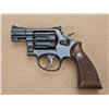 Image 1 : Smith & Wesson model 10, .38 special, 2” barrel,  adjustable sights, blued finish, checkered  medall