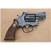 Image 3 : Smith & Wesson model 10, .38 special, 2” barrel,  adjustable sights, blued finish, checkered  medall