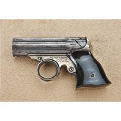 Remington .22 caliber zig-zag double-action  six-shot .22 caliber pepperbox derringer, blue and  sil