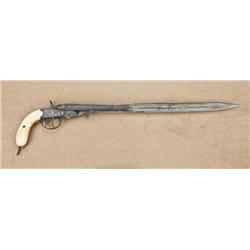 Double-barrel centerfire antique blackpowder  pistol, nicely engraved with ivory grips, and  origina