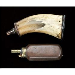 Lost consisting of a turned-horn pistol-size  flask, approx. 5-1/2” from tip to end, simple  constru