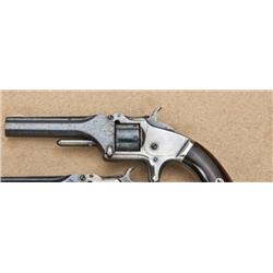 Smith & Wesson first-model second-issue .22  caliber revolver, blue and silver finish, varnish  rose