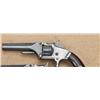 Image 1 : Smith & Wesson first-model second-issue .22  caliber revolver, blue and silver finish, varnish  rose